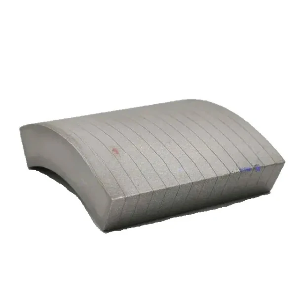 Laminated NdFeB magnet for reduced eddy-current loss