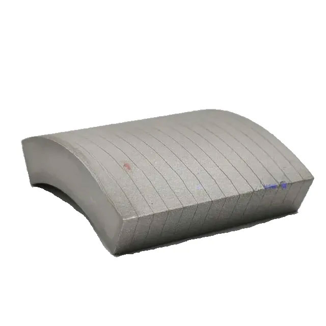 Laminated neodymium arc magnet for high speed motors