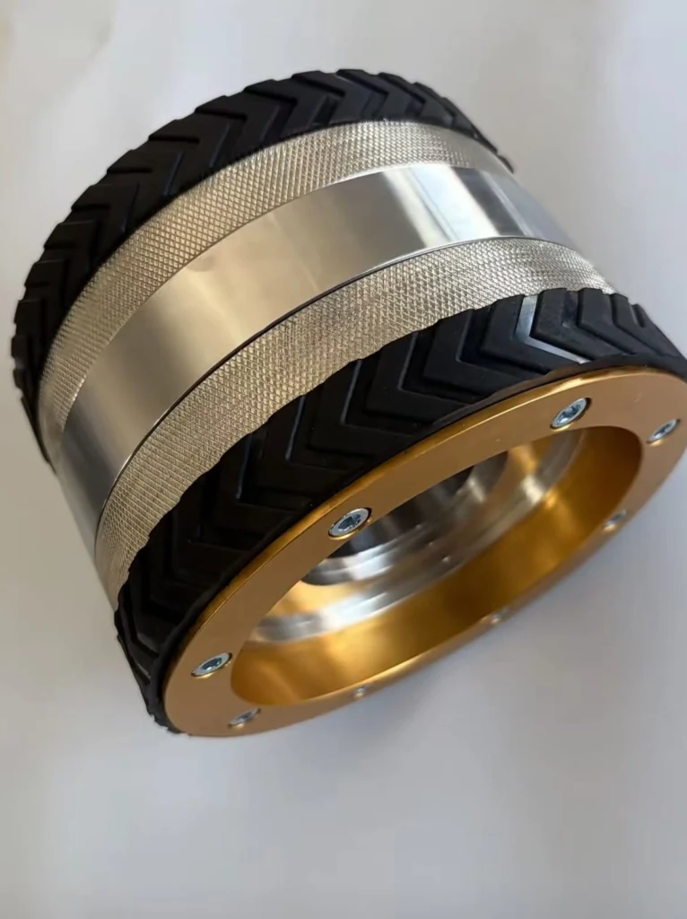 Magnetic Wheels for Climbing Robots: Design, Traction and Safety