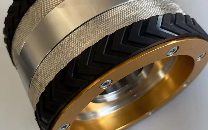 Magnetic Wheels for Climbing Robots: Design, Traction and Safety