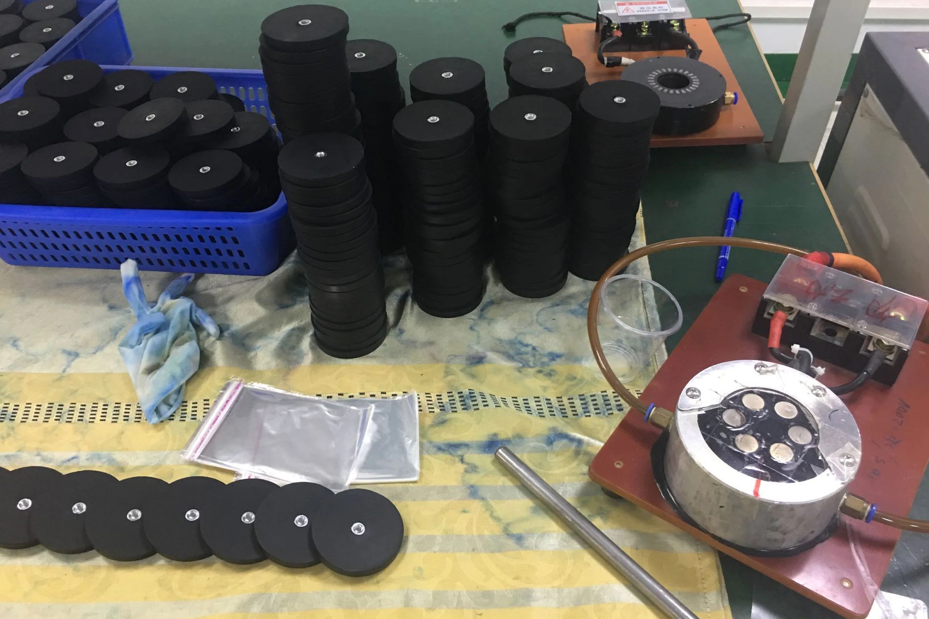 Rubber coated magnets with magnetizing fixtures