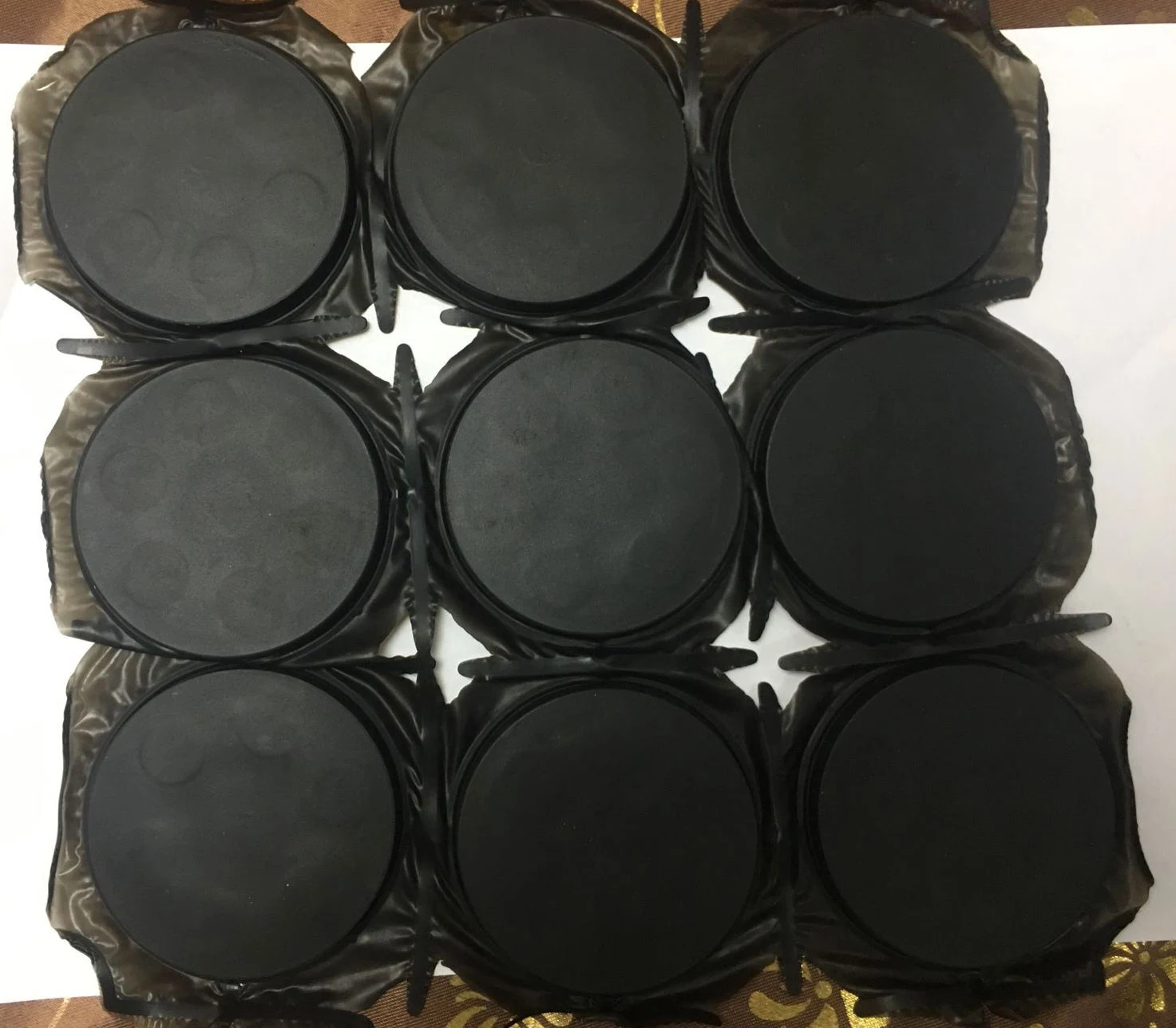 Rubber coated assemblies before trimming