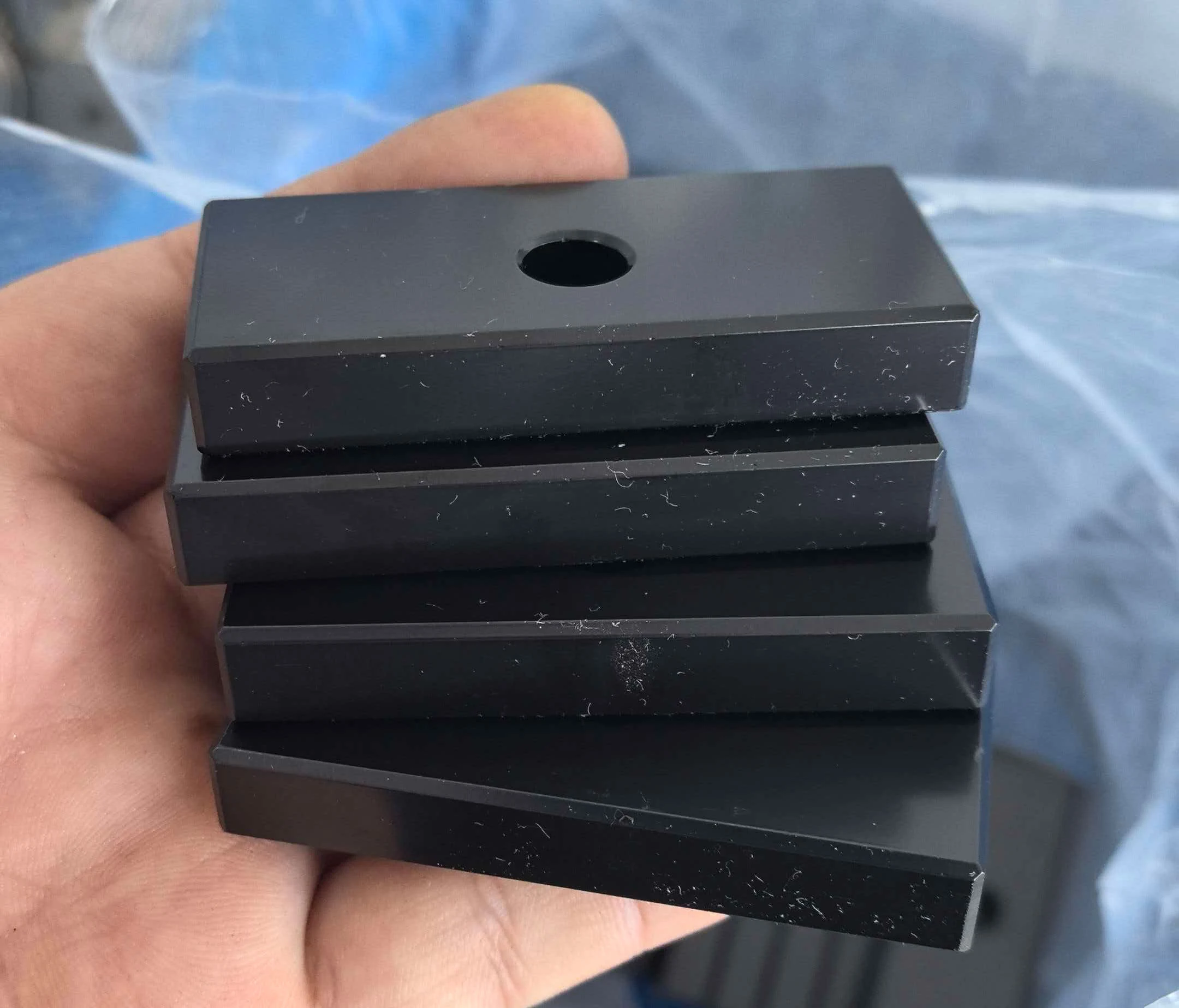 Black epoxy-coated rectangular magnet blocks with centre holes